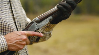 Foto: Jäger mit einem Gewehr
