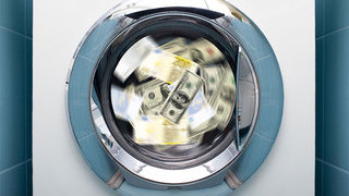 Foto:  Geldscheine in Waschmaschine
